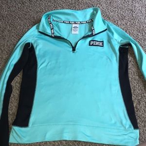 I’m selling a Turquoise Pink running shirt